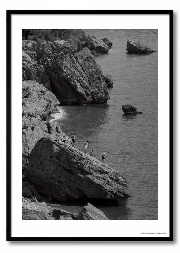 Mediterranean coast photography print showing four figures on limestone rocks above a calm sea, monochrome coastal observation